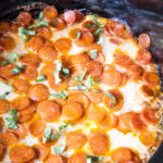 cropped close up crockpot pizza dip in crockpot