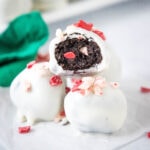 close up peppermint oreo truffles on a plate