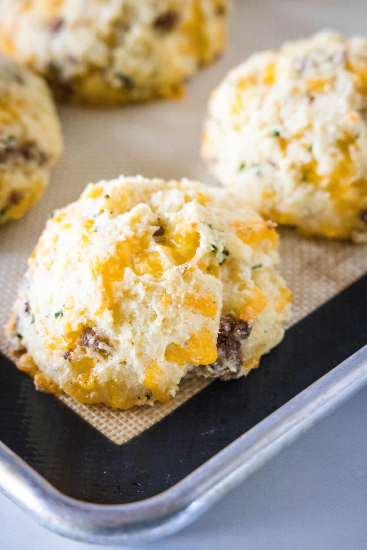 baked sausage biscuit on baking tray