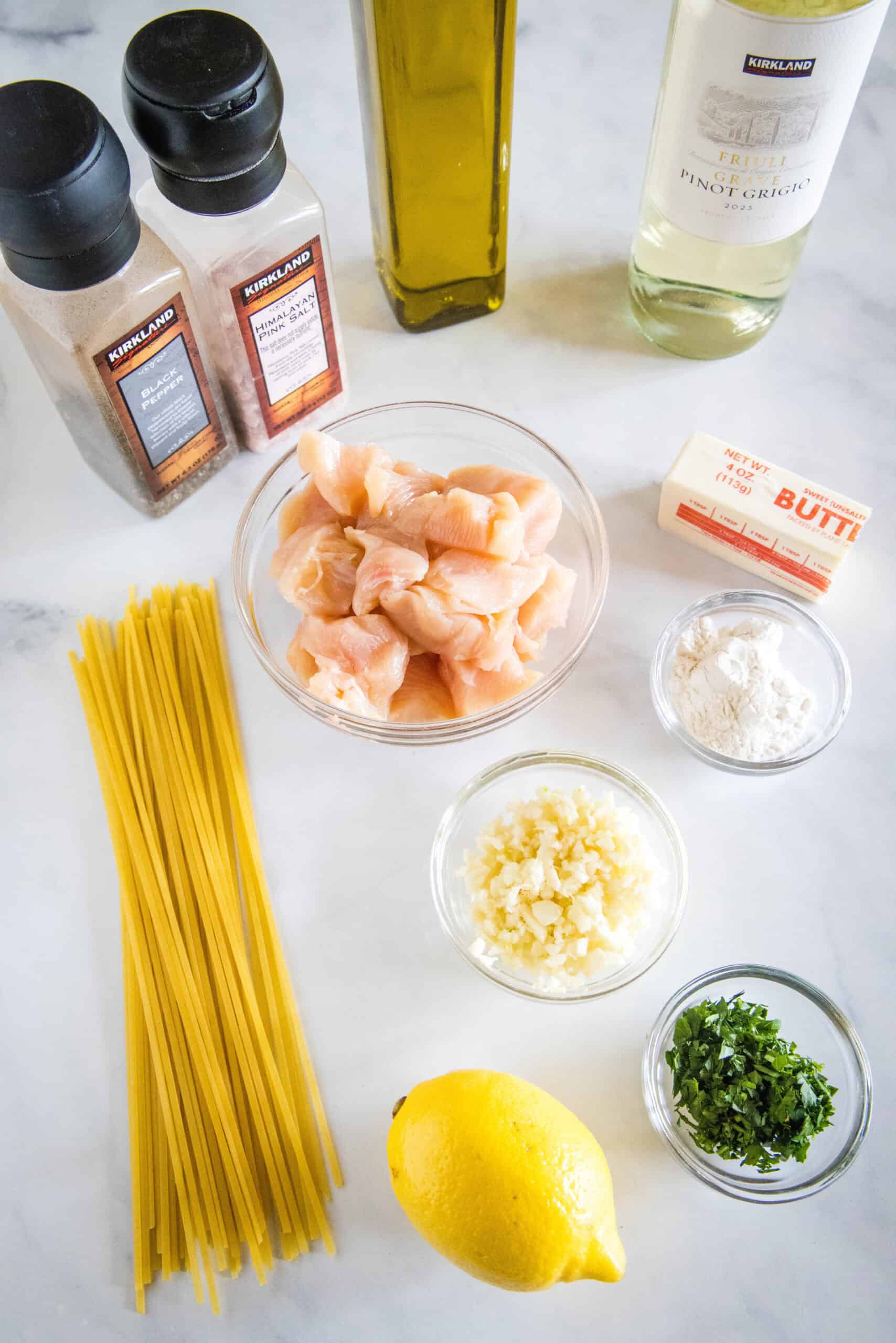 This chicken scampi recipe is a quick, easy chicken pasta with juicy chicken bites cooked in a buttery white wine sauce with garlic and lemon. Chicken scampi ingredients.