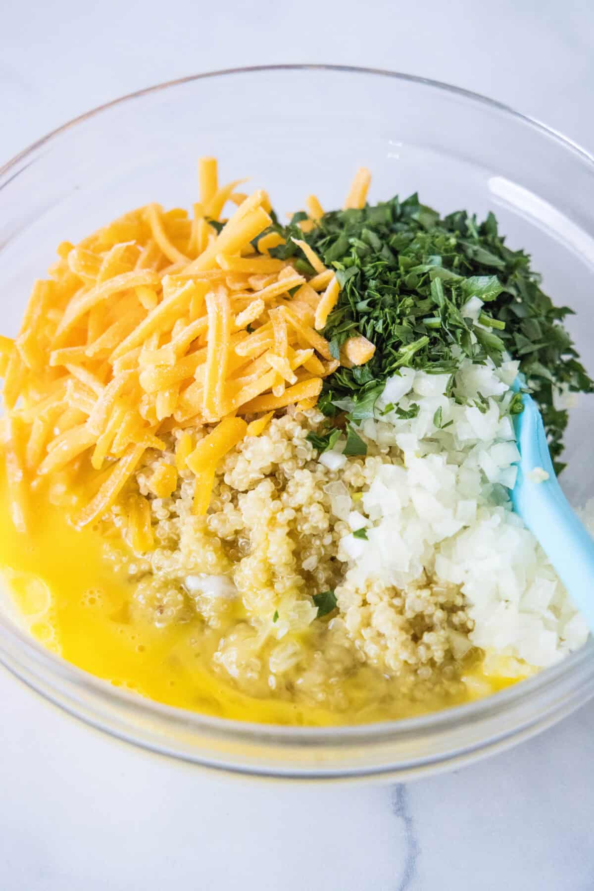 quinoa bites ingredients in a mixing bowl