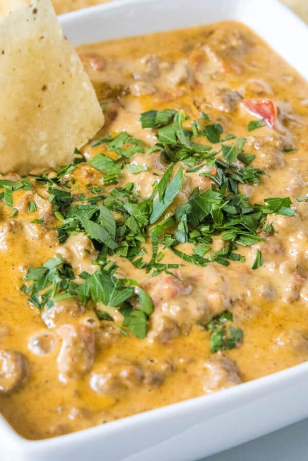 cropped close up cheesy rotel dip in a bowl