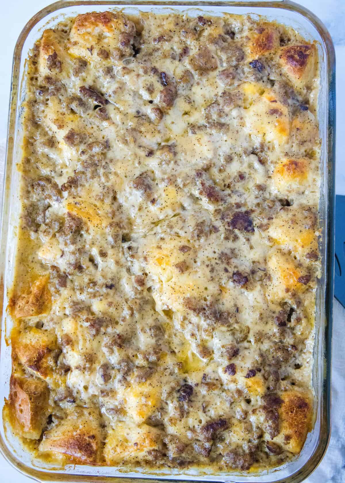 looking down on casserole of baked biscuits and gravy casserole