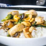 close up chicken stir fry over rice