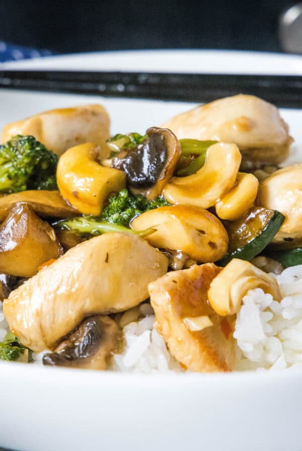 close up chicken stir fry over rice