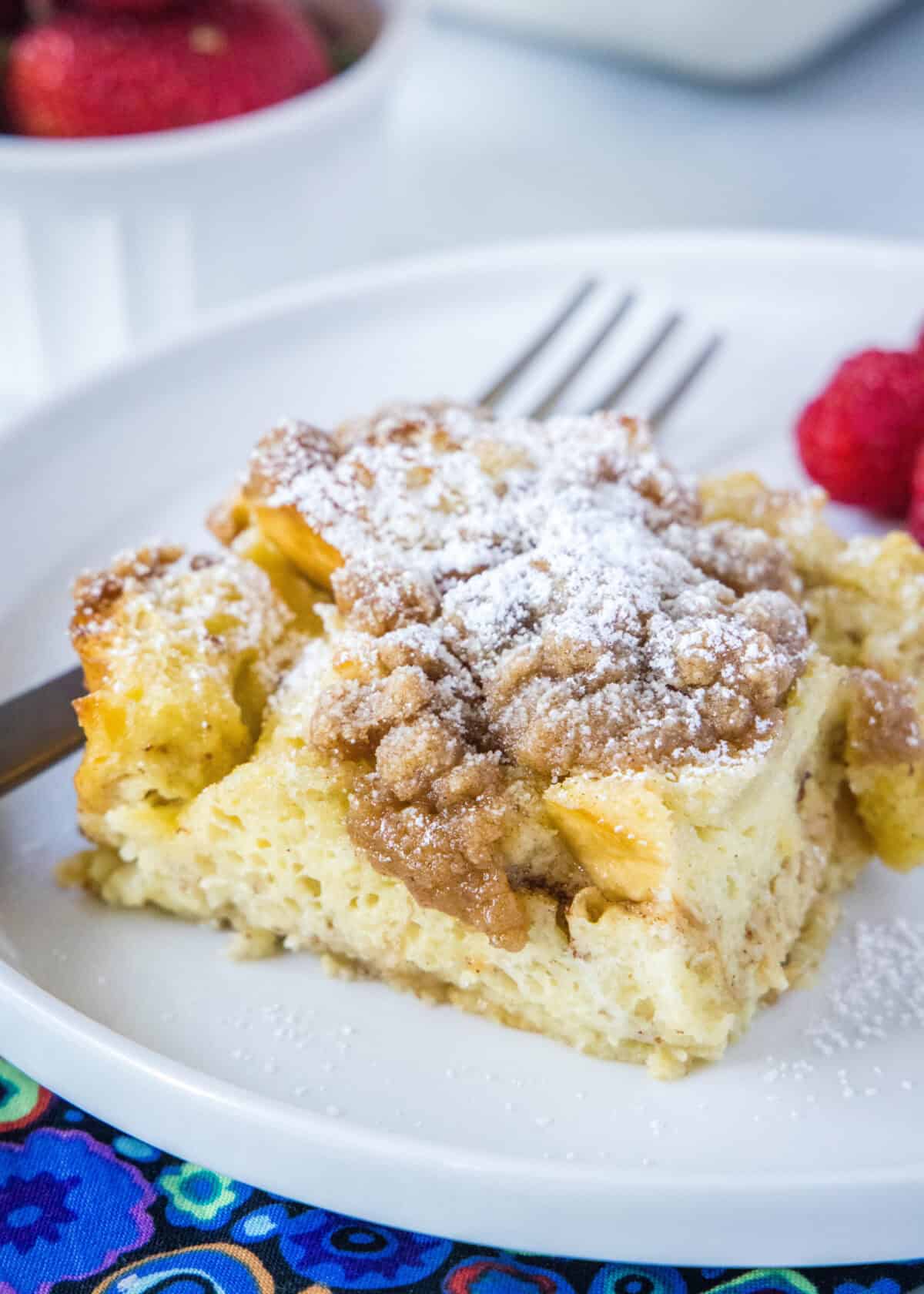 slice of french toast casserole with powdered sugar