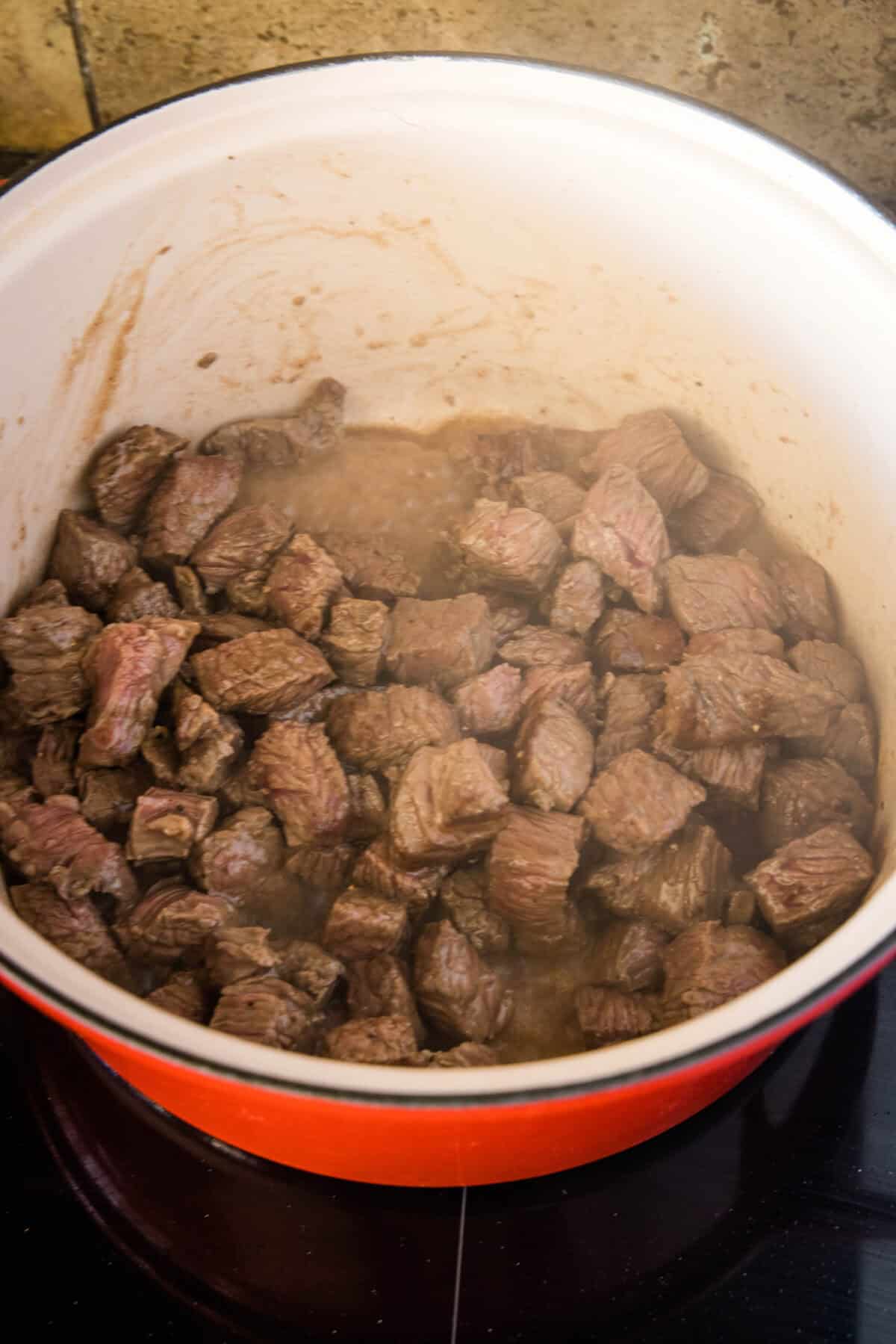 browning beef in a stock pot