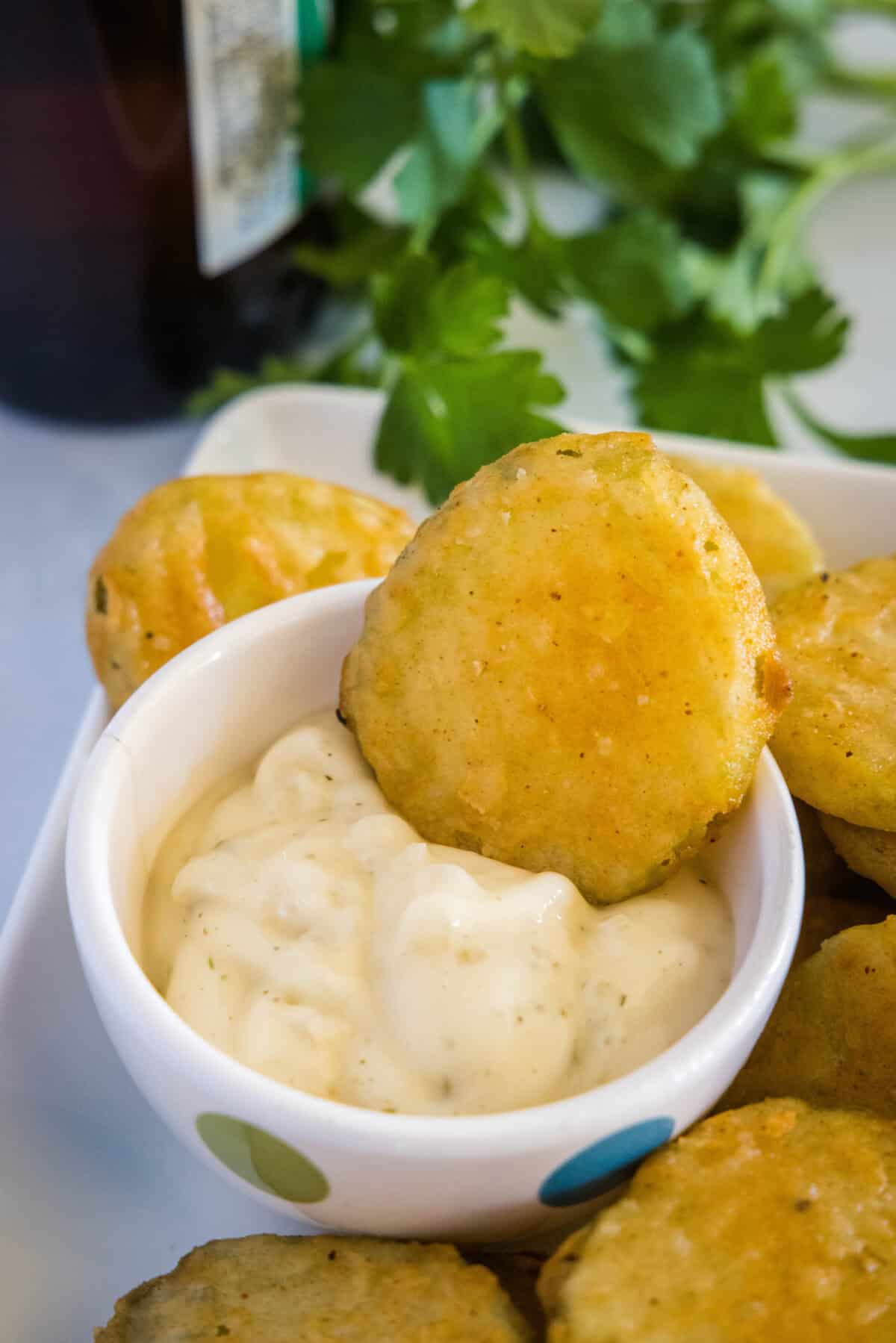 dipping fried pickle in ranch