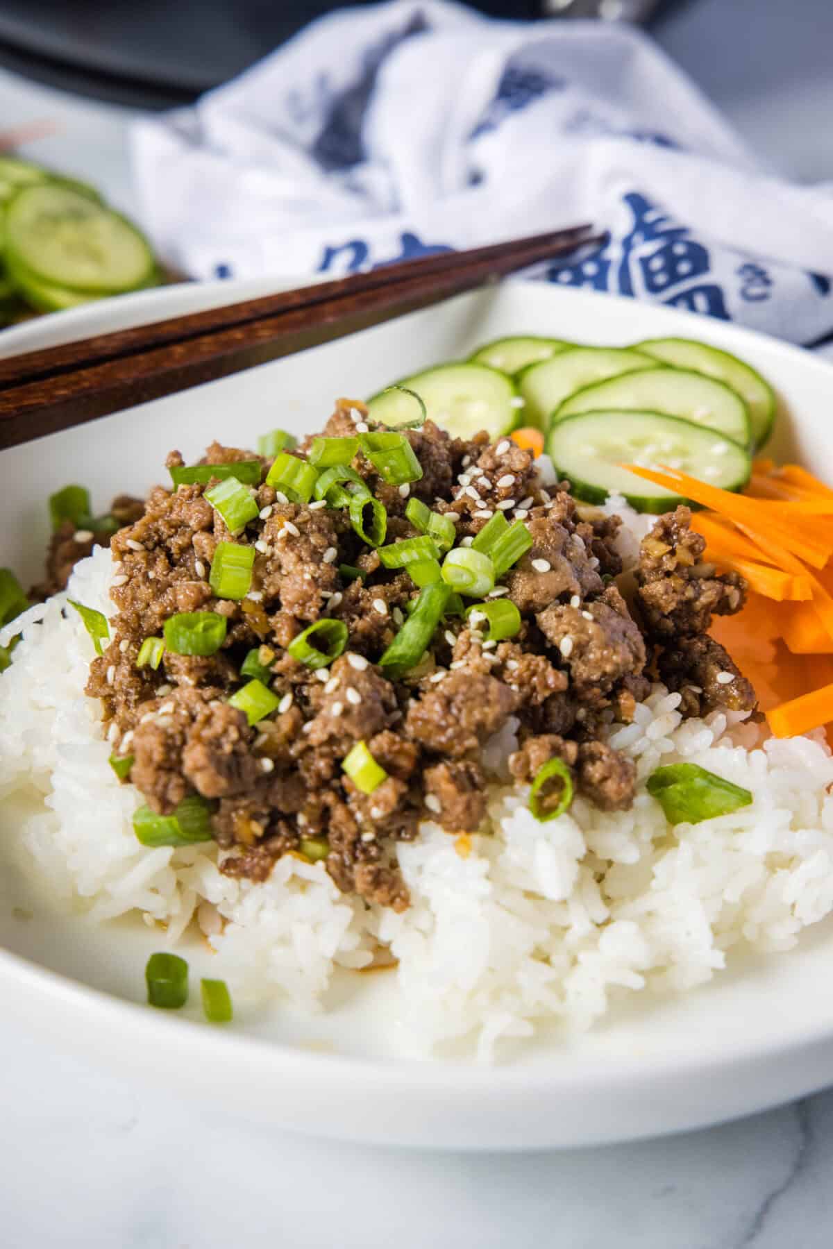 korean beef bowls on a white plate