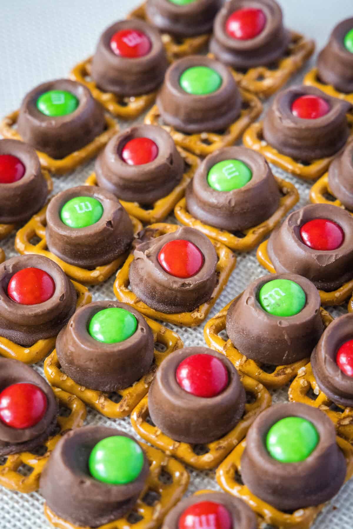 rolo pretzels setting up on baking tray