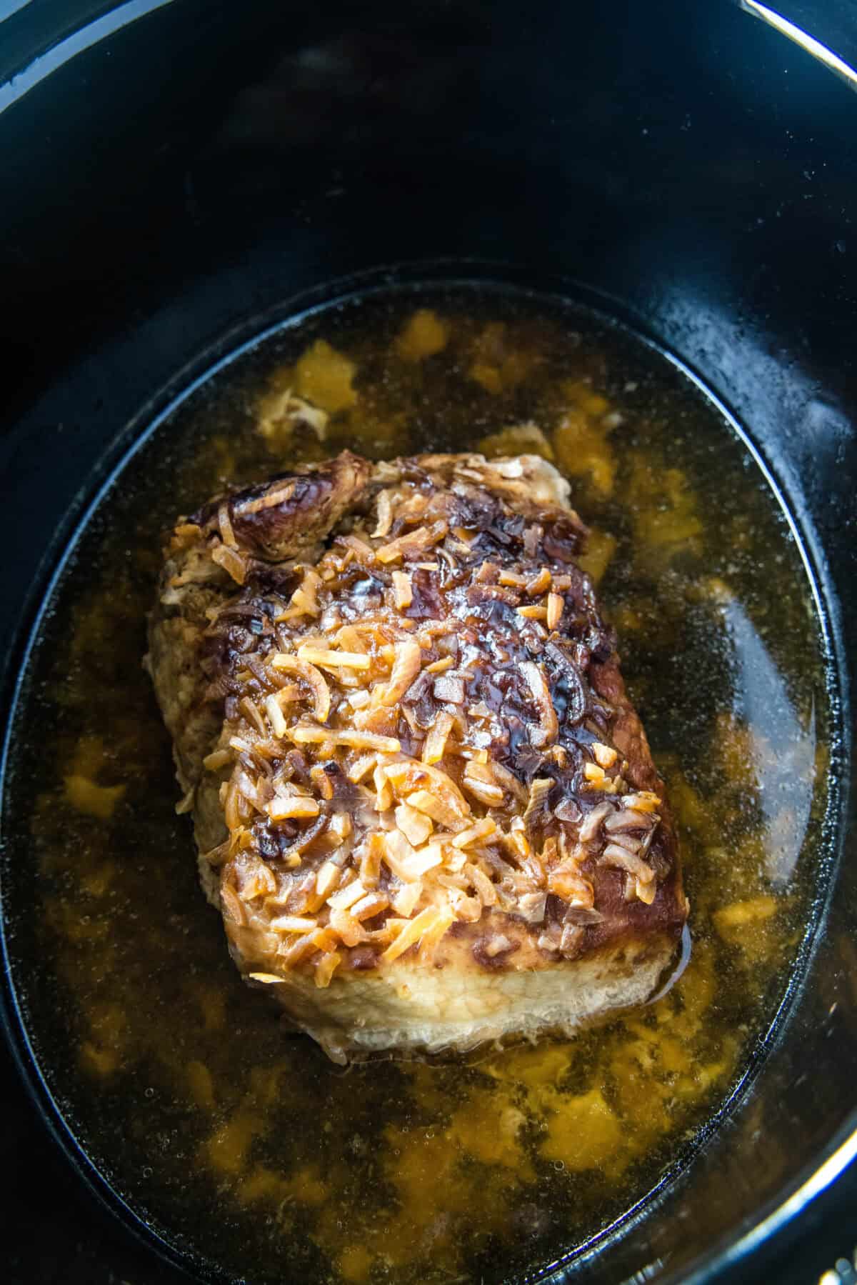 cooked pork roast in slow cooker