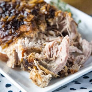 close up pork roast from the crock pot on a plate