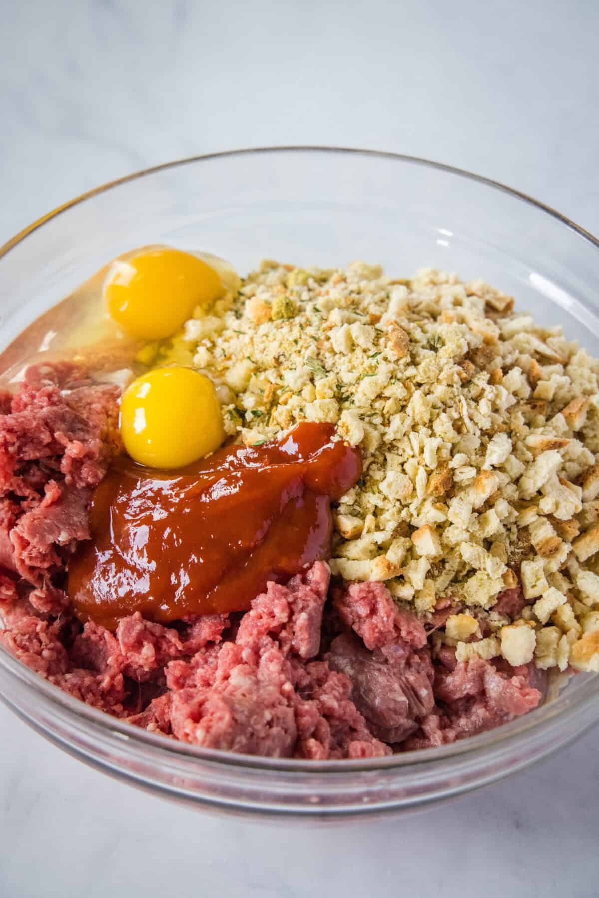 stovetop meatloaf ingredients in mixing bowl