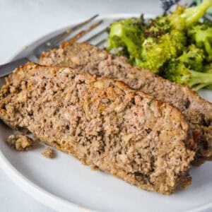 cropped close up slices of meatloaf on a plate