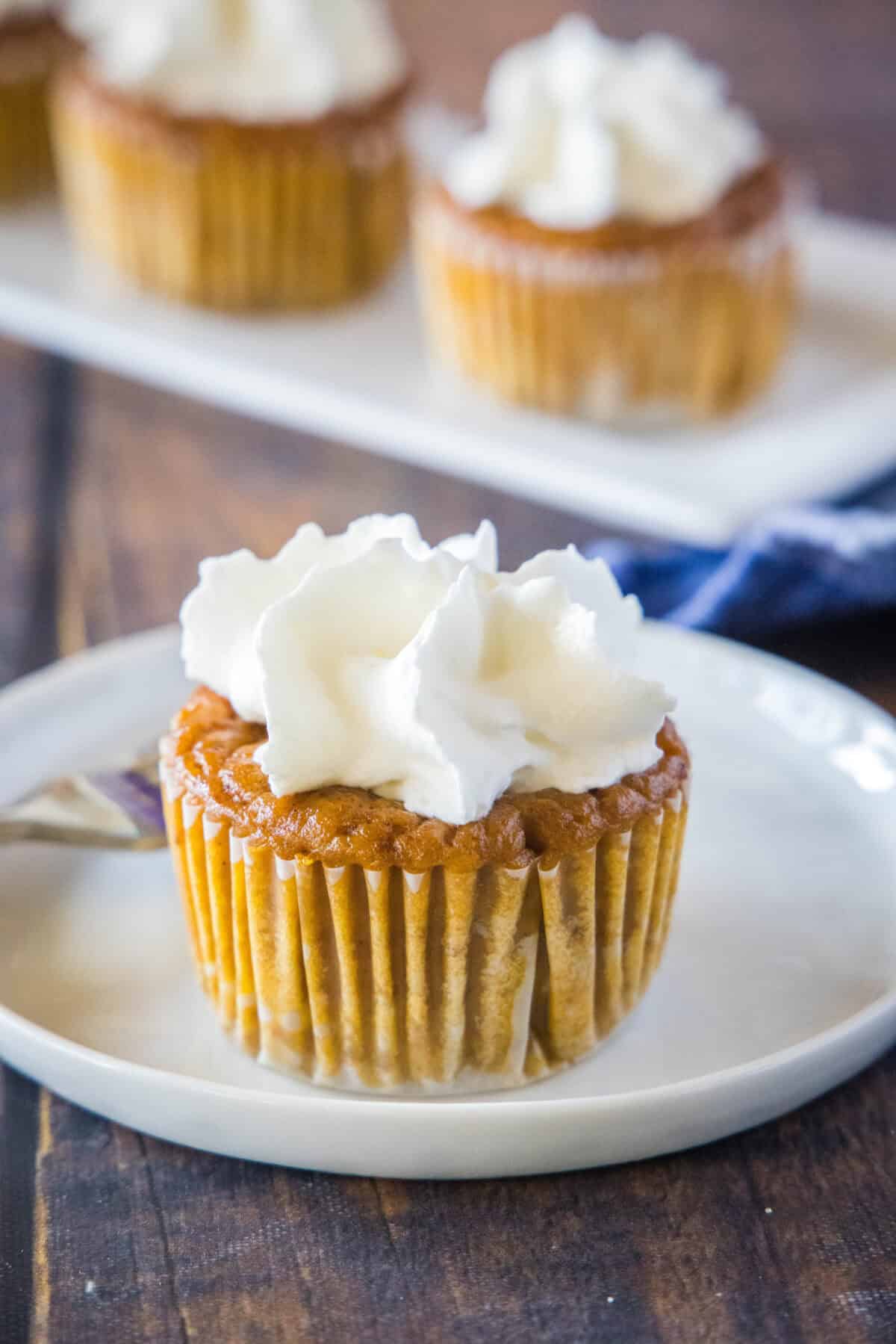 pumpkin pie cupcake on a white plate