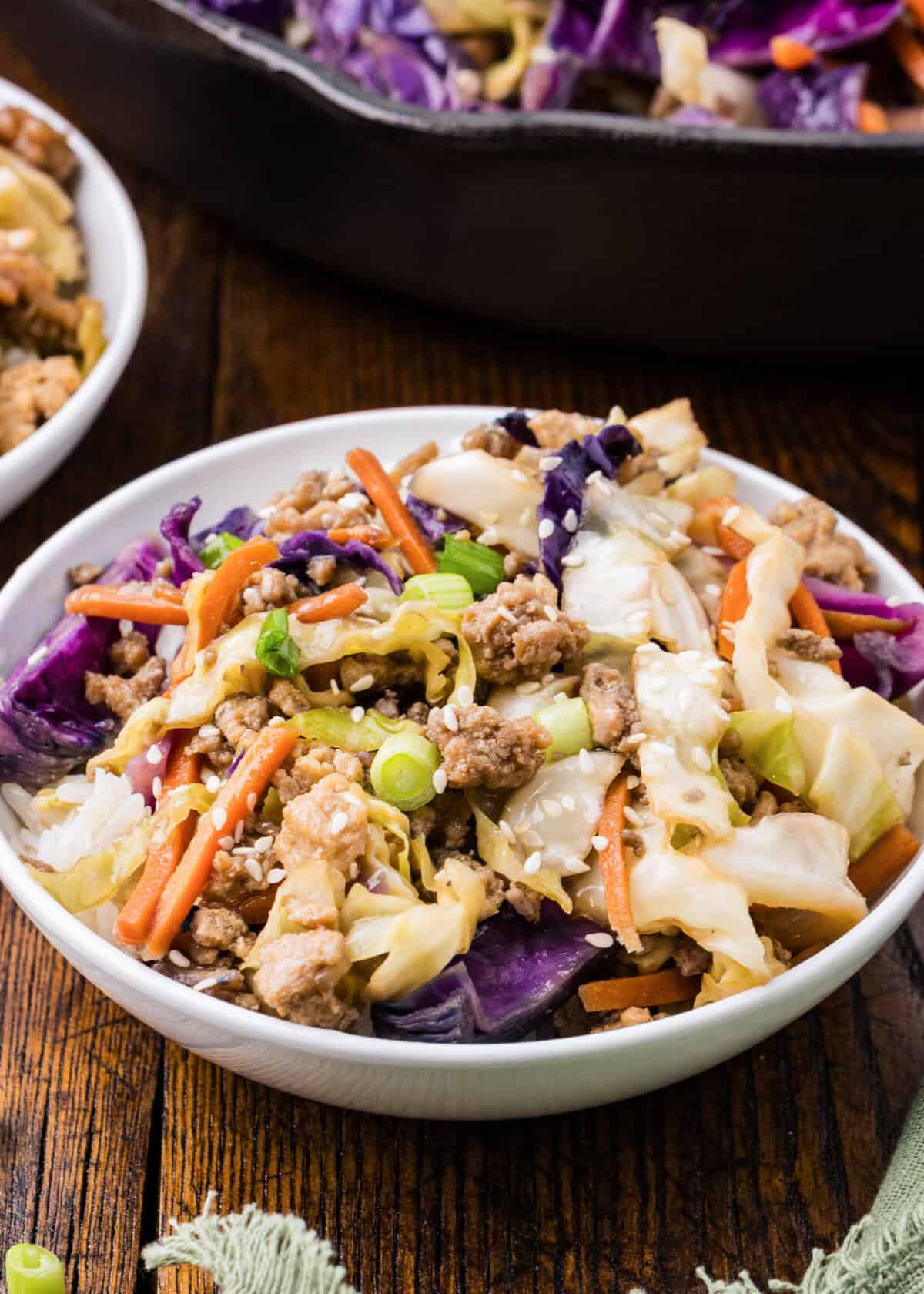 egg roll in a bowl over rice