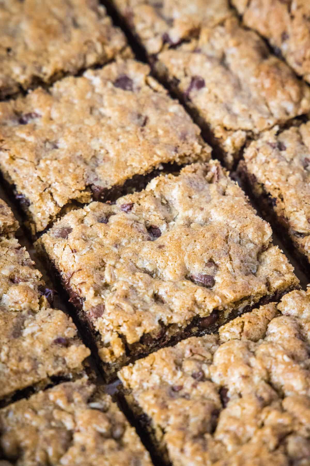 chocolate chip oatmeal bars cut on a cutting board