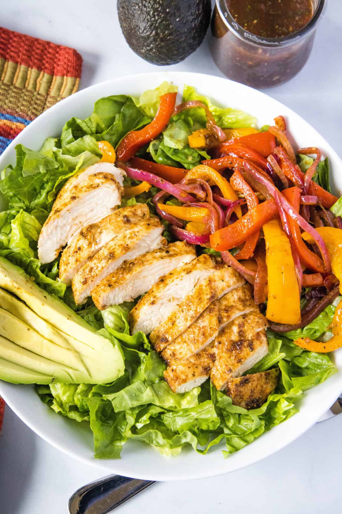 looking down on chicken fajita salad in a bowl