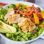 cropped closeup chicken fajita salad in a bowl