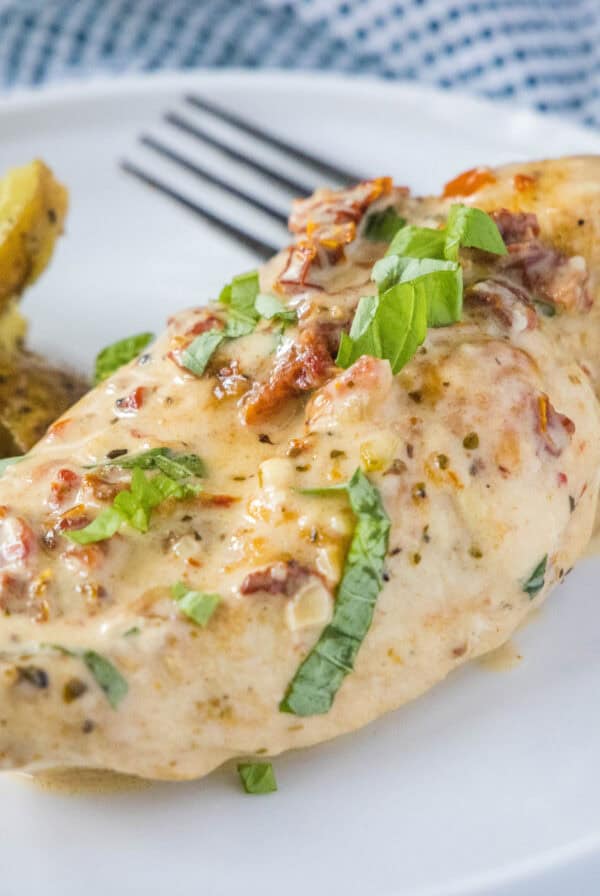 close up marry me chicken on a white plate