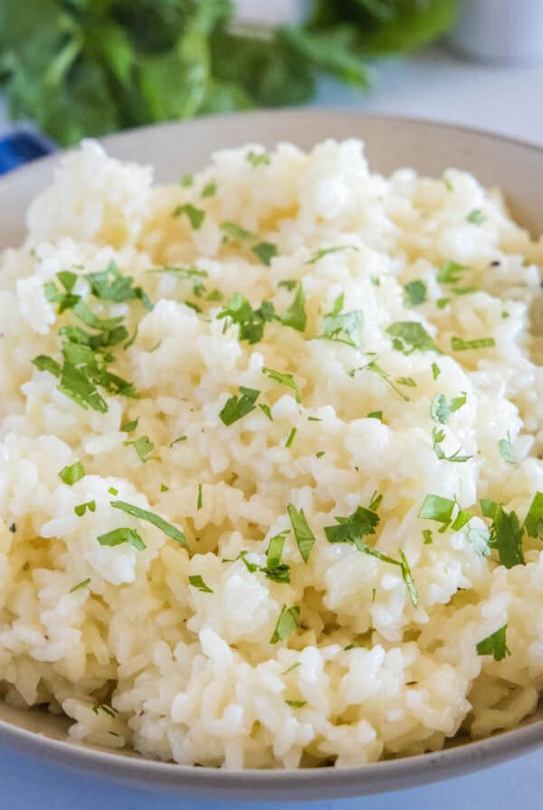 close up serving bowl with garlic butter rice