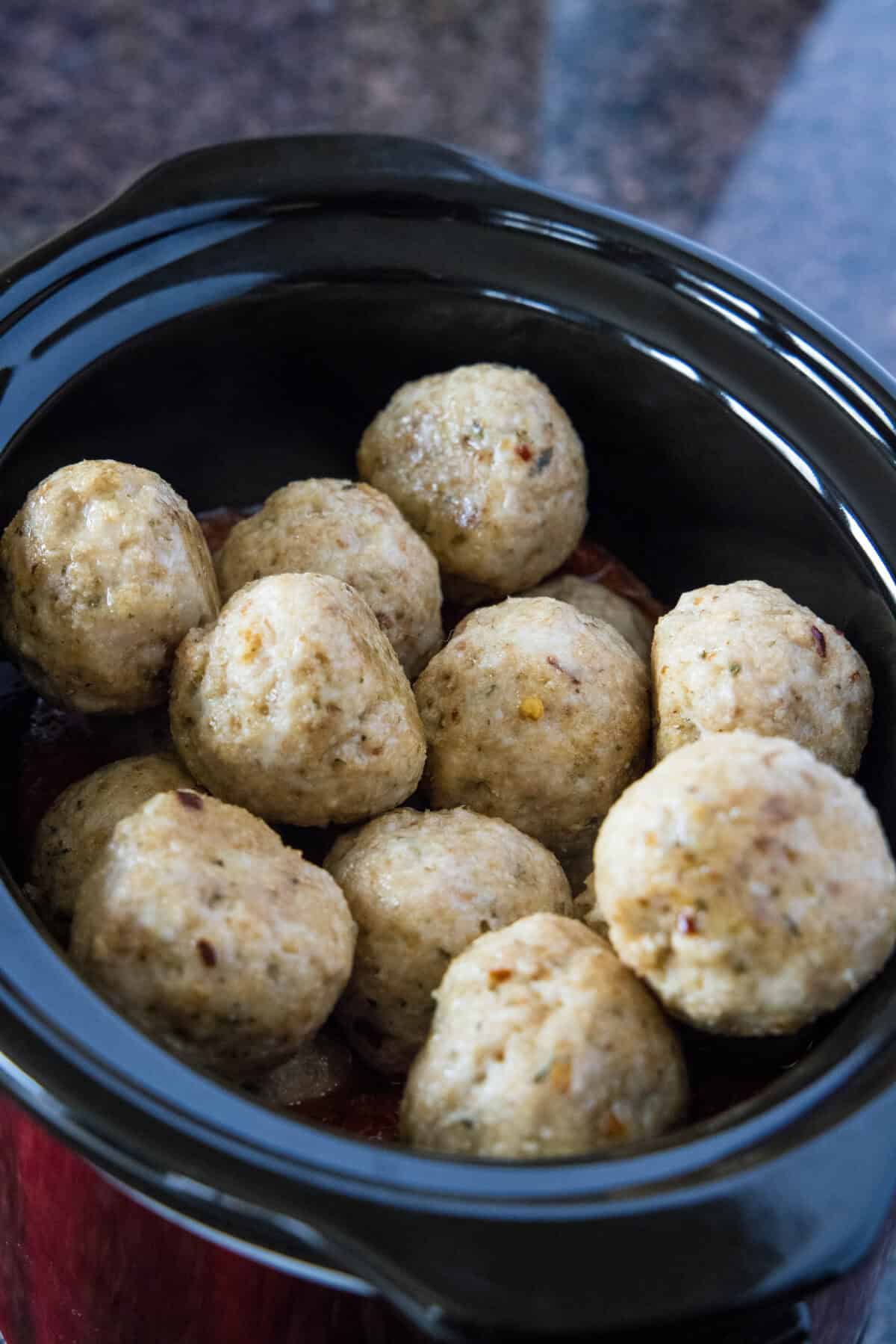 Italian Meatballs | @dinnersdishesdessert baked italian chicken meatballs added to crockpot