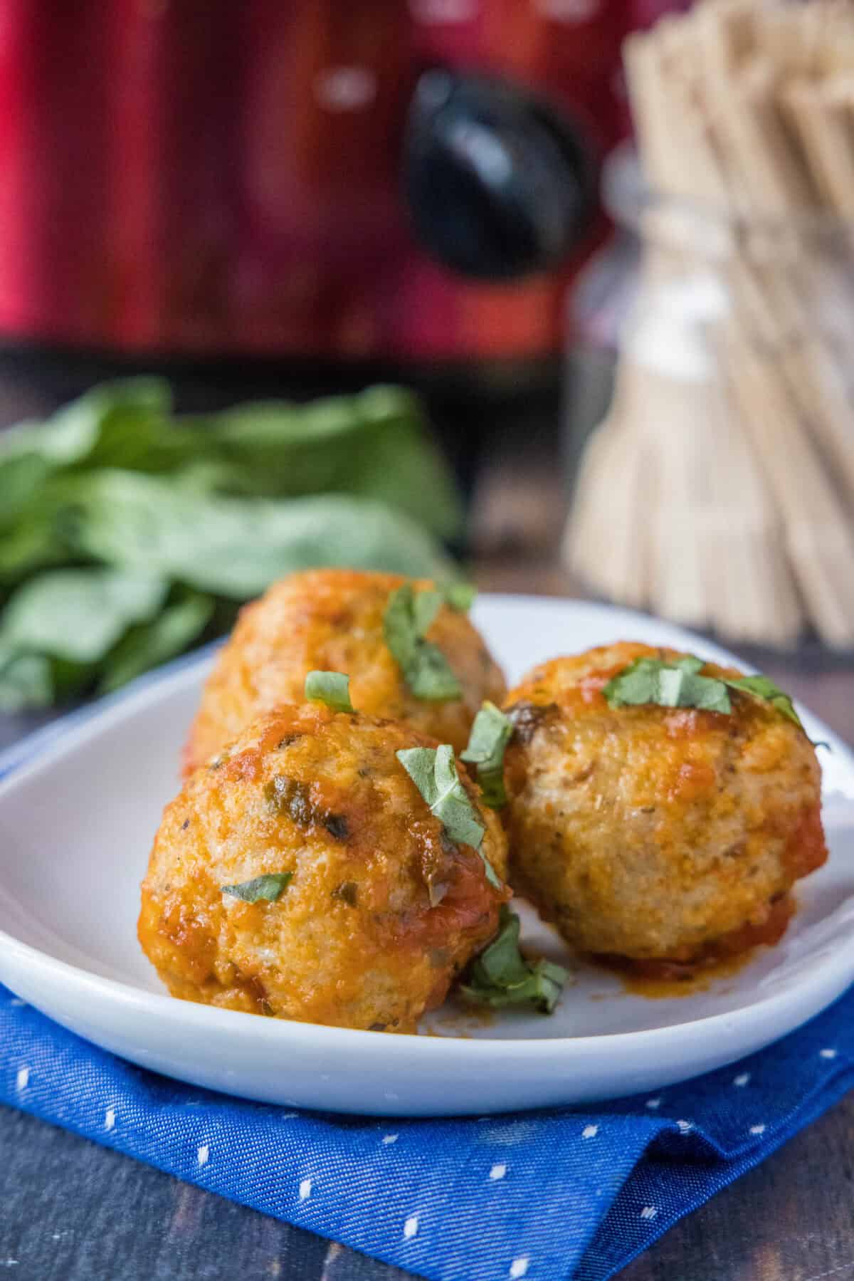 italian chicken meatballs on a plate