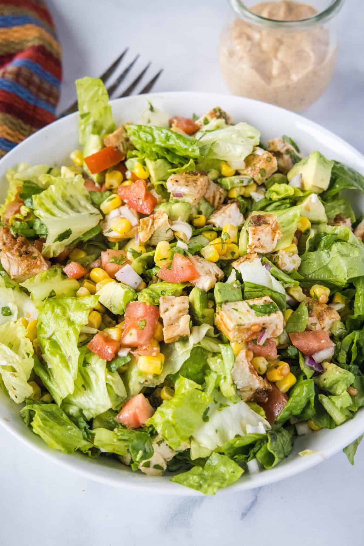mexican chopped salad mixed together in a serving bowl