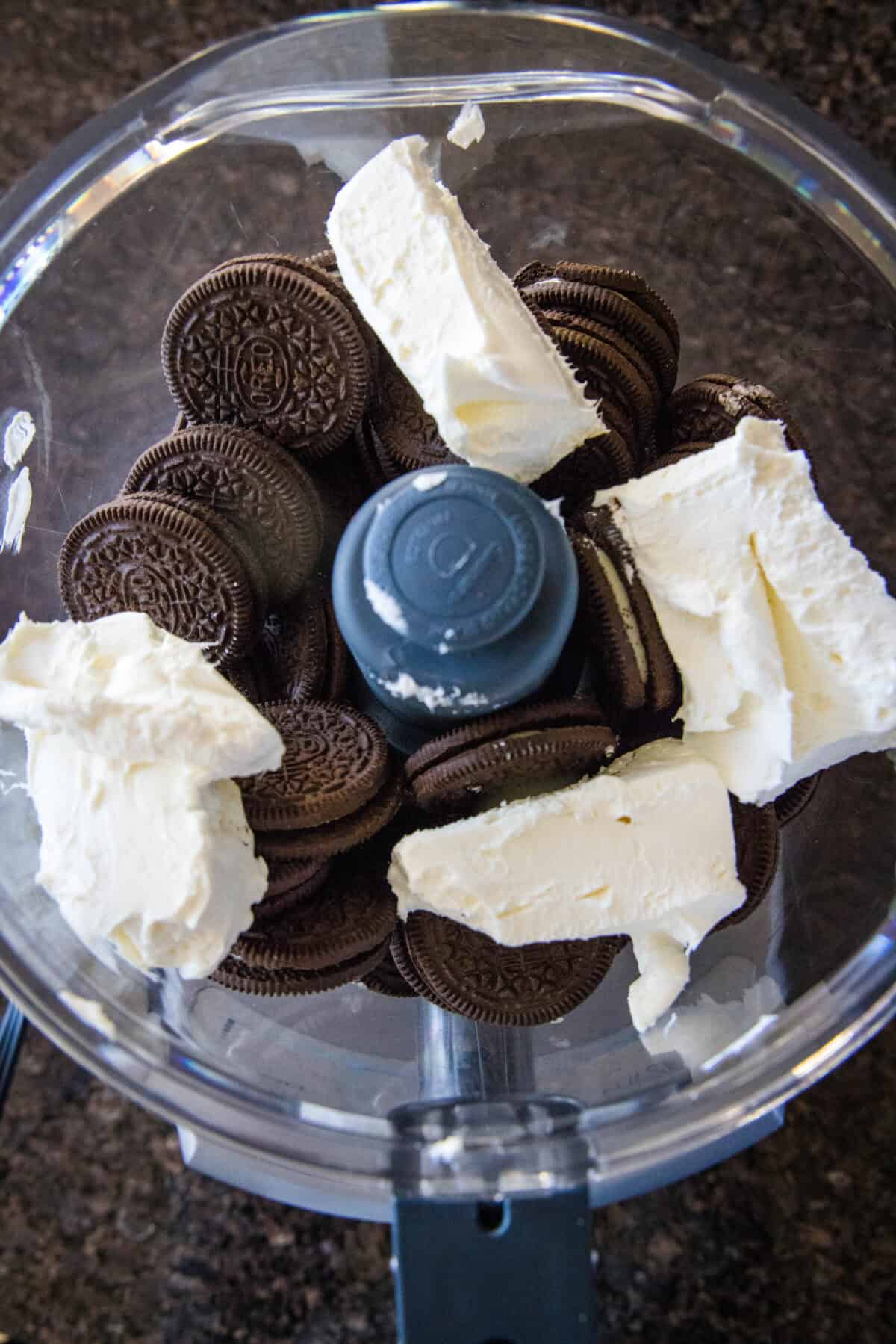 oreo cookies and cream cheese in food processor