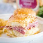cropped square close up reuben sliders on a plate