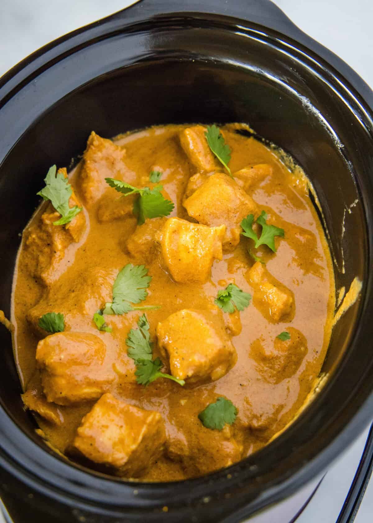 looking down on chicken tikka masala in crockpot
