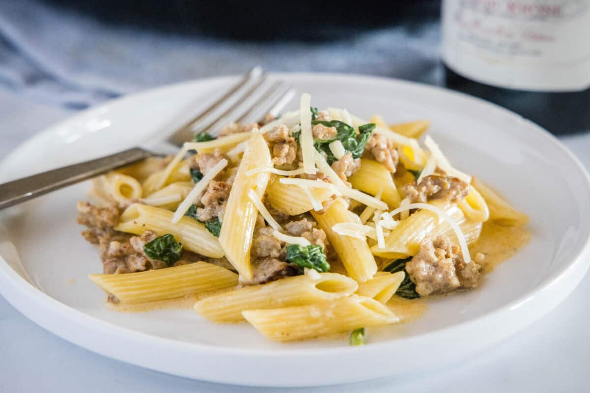 Sausage Pasta with Spinach – A quick, comforting pasta made with Italian sausage, tender spinach, and a creamy Parmesan sauce that comes together in one pan.