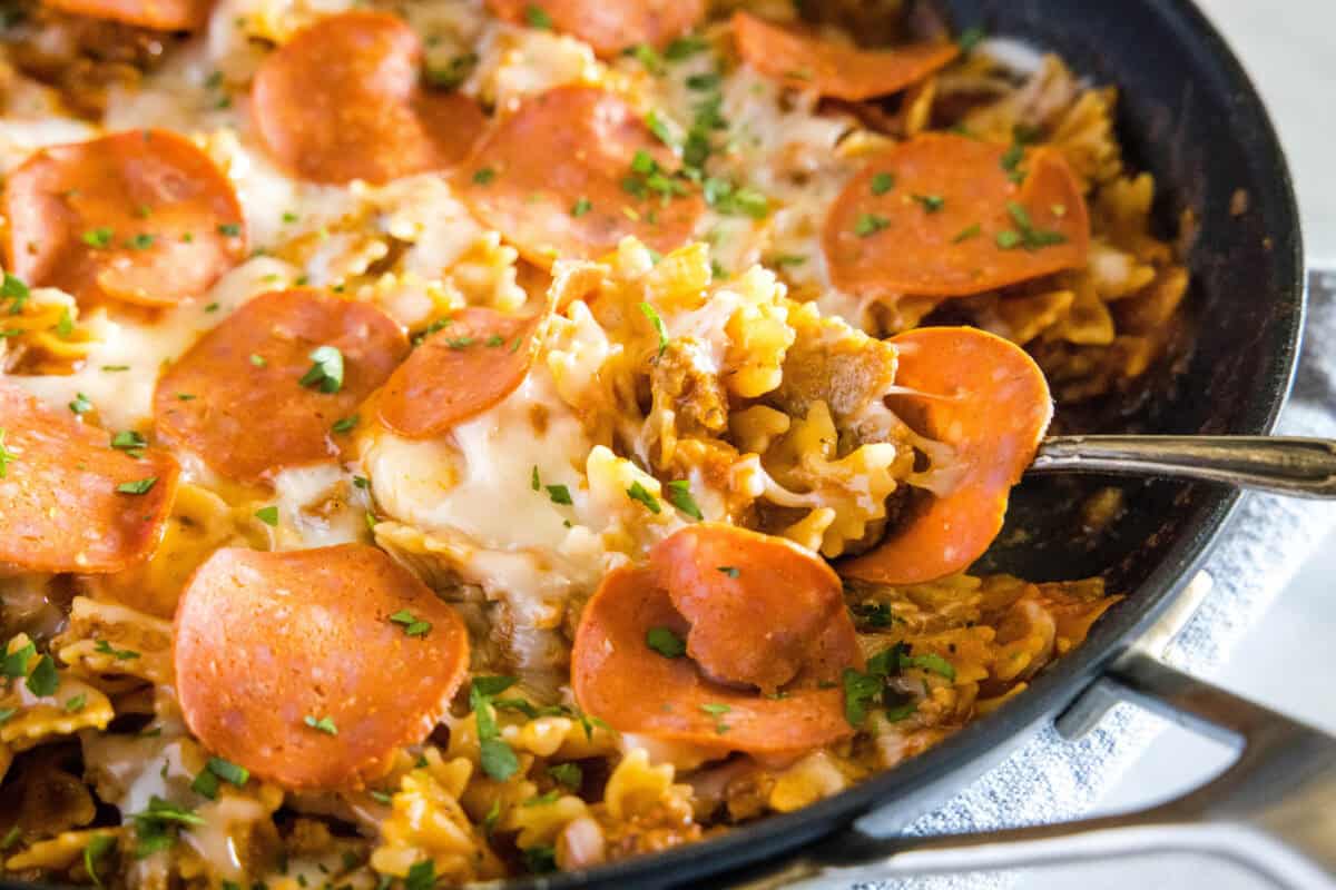 Pizza Pasta combines all the flavors of your favorite pizza with hearty pasta for a quick, cheesy, family-friendly dinner.