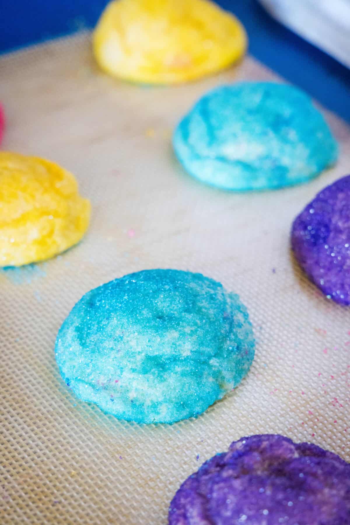 easter blossom cookies on baking sheet before adding chocolate