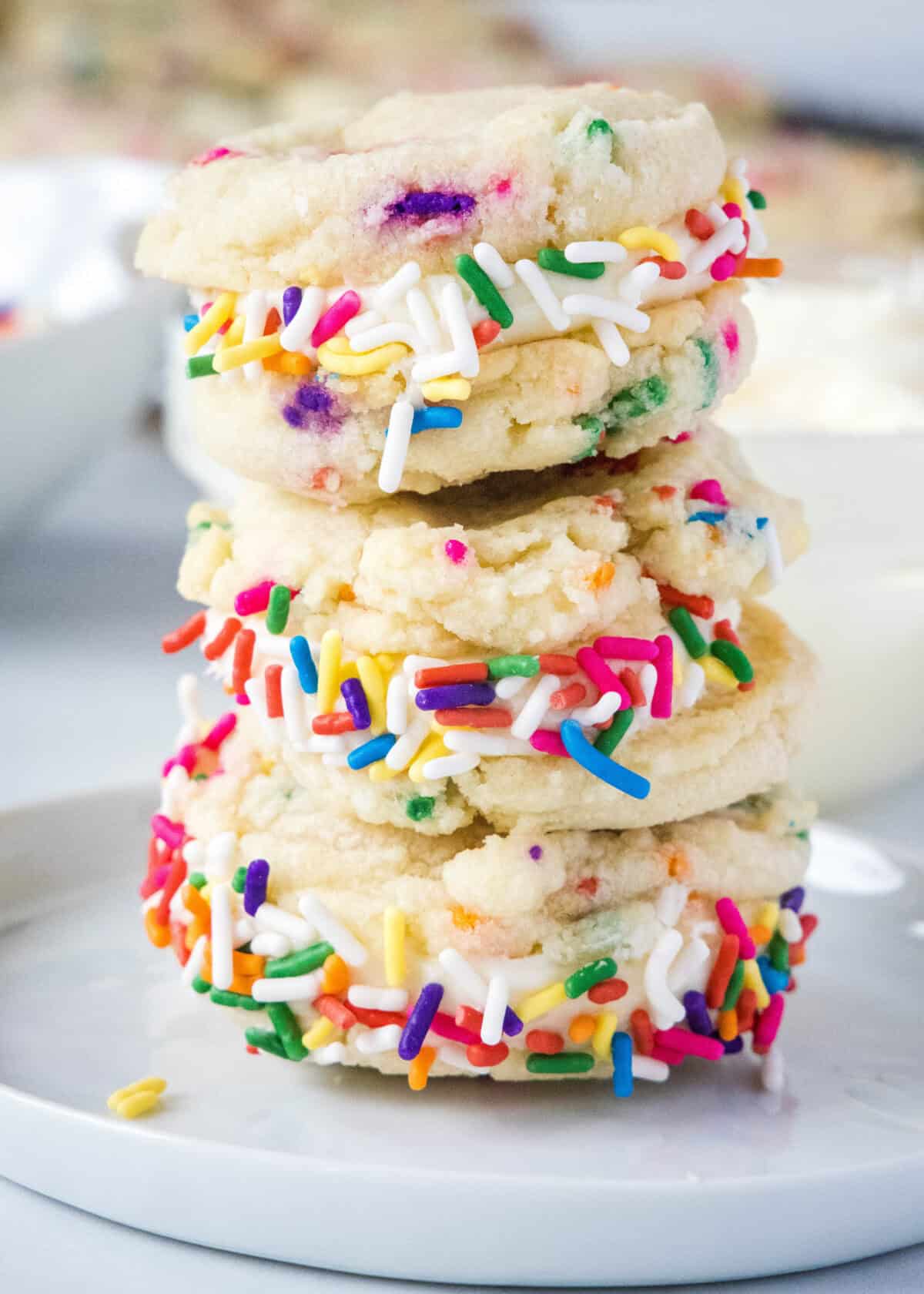 Funfetti Cookies funfetti sandwich cookies stacked on a plate
