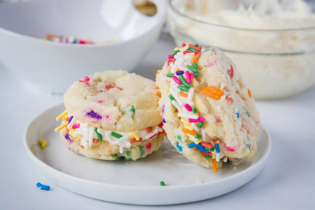 Funfetti Sandwich Cookies are soft, homemade funfetti cookies with creamy buttercream frosting. A fun and easy dessert perfect for any celebration.