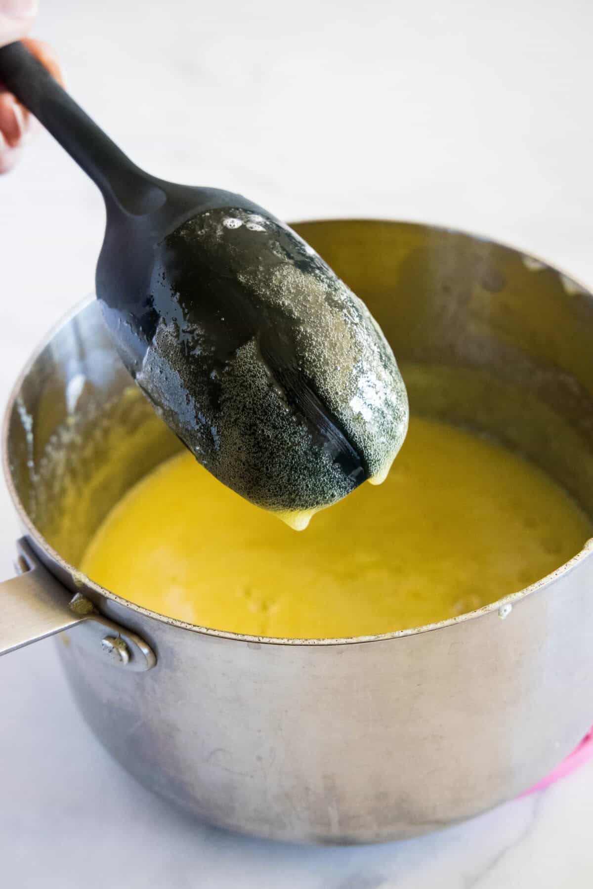 lemon curd on the back of the spoon