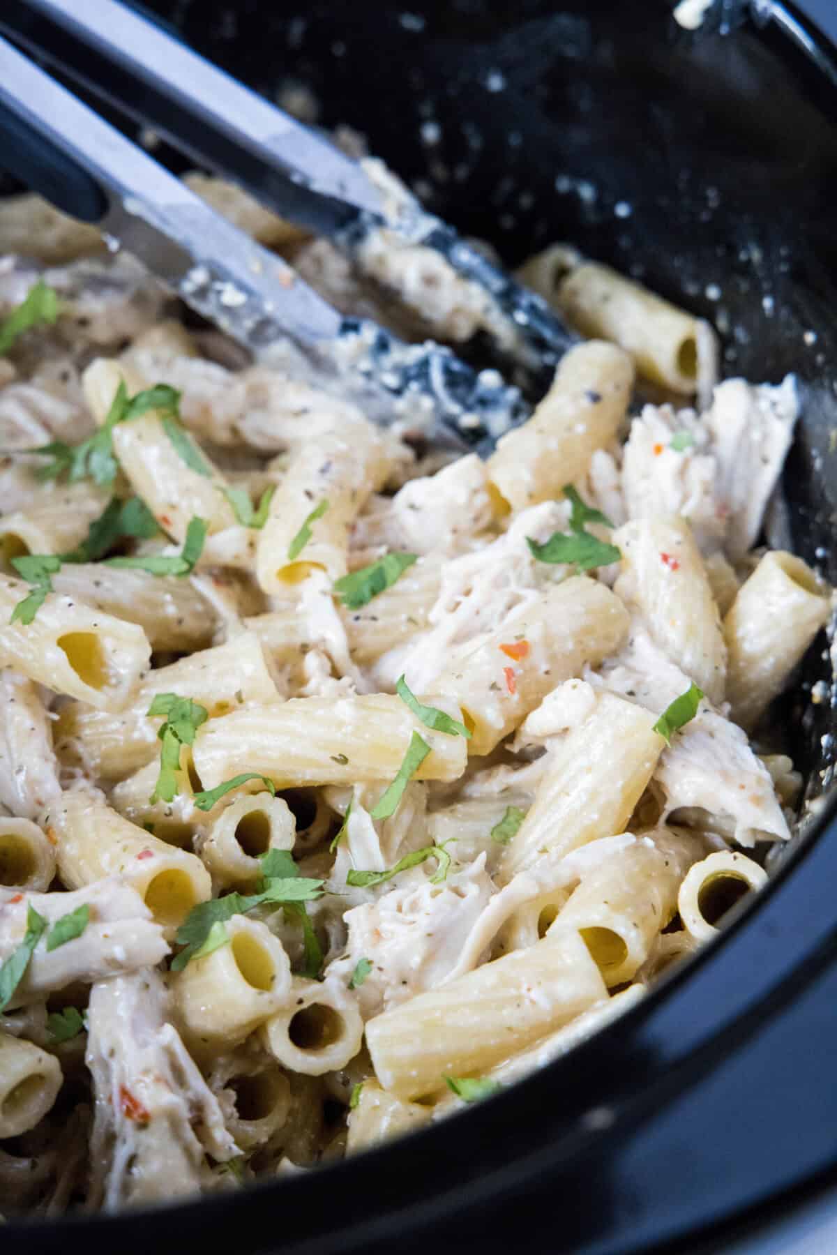 slow cooker garlic parmesan chicken pasta in crockpot