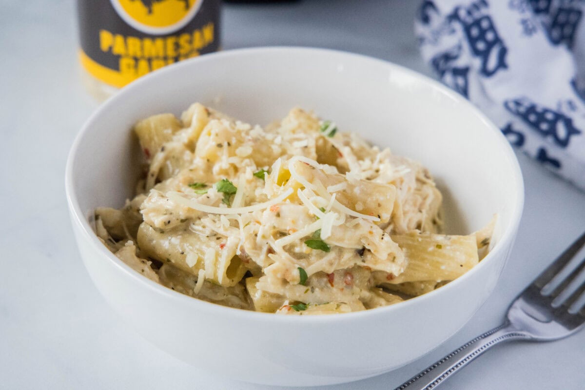 Slow Cooker Garlic Parmesan Chicken Pasta is a creamy, easy dinner with tender chicken in a rich garlic parmesan sauce. Perfect for a comforting slow cooker meal.
