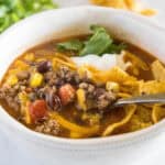 close up taco soup in a bowl with a spoon