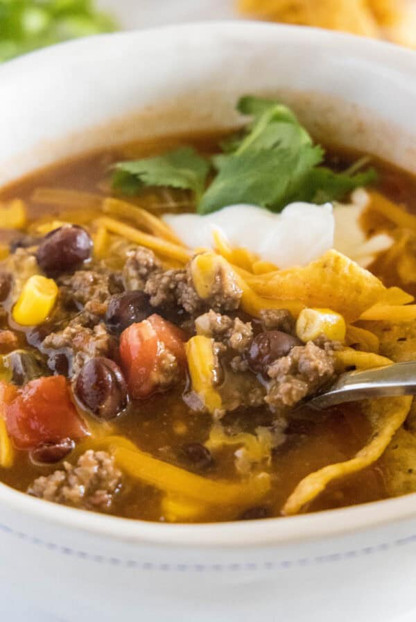 close up taco soup in a bowl with a spoon