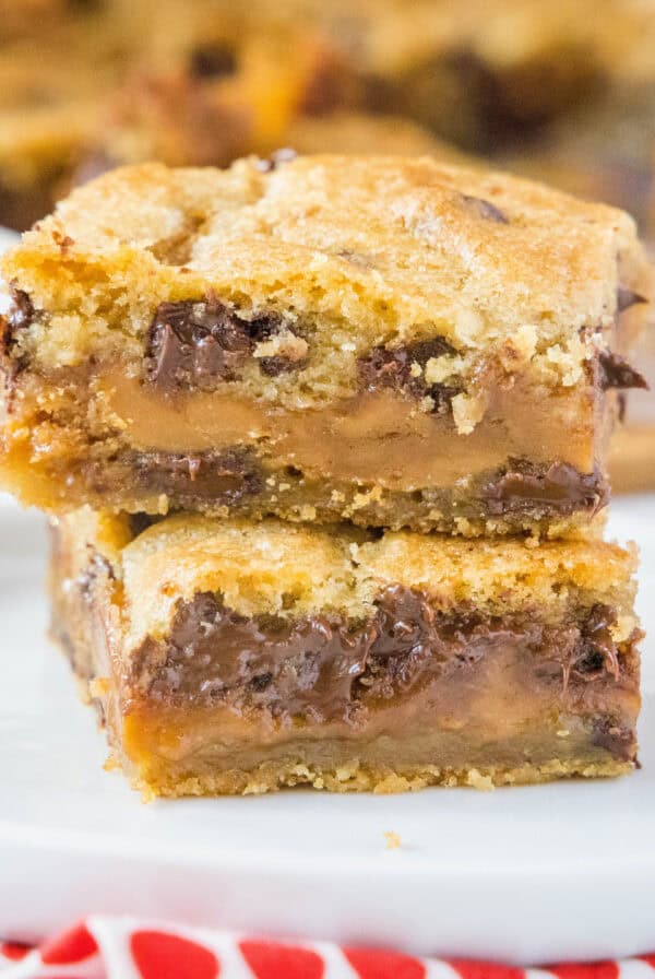 close up stacked biscoff cookie bars on a plate