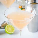 close up grapefruit martini in a glass