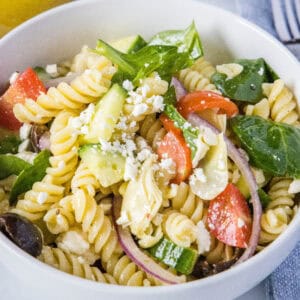 close up bowl of mediterranean pasta salad