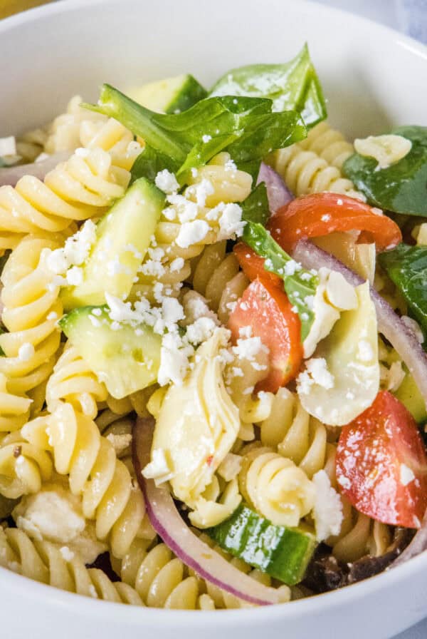 close up bowl of mediterranean pasta salad