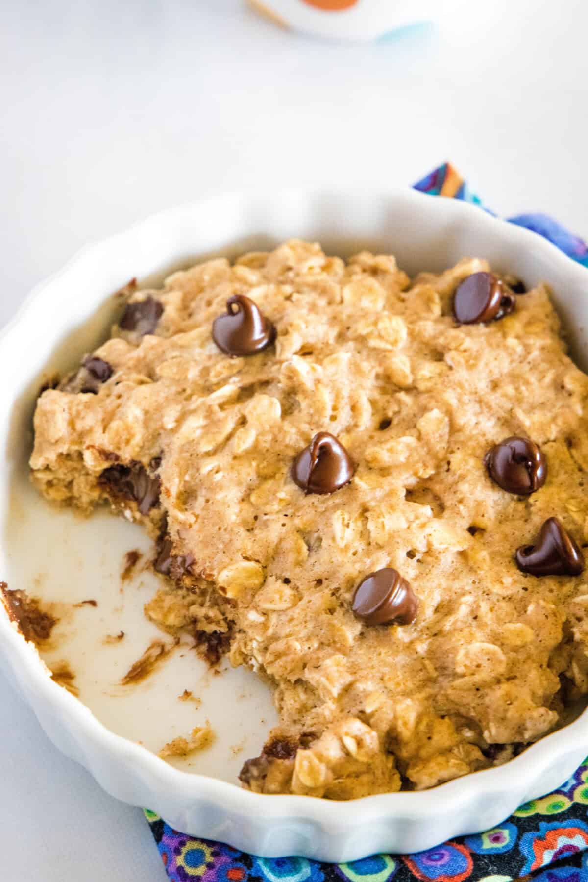 Oatmeal Breakfast Cookie 2_labeled microwave oatmeal cookie with bites missing in a bowl