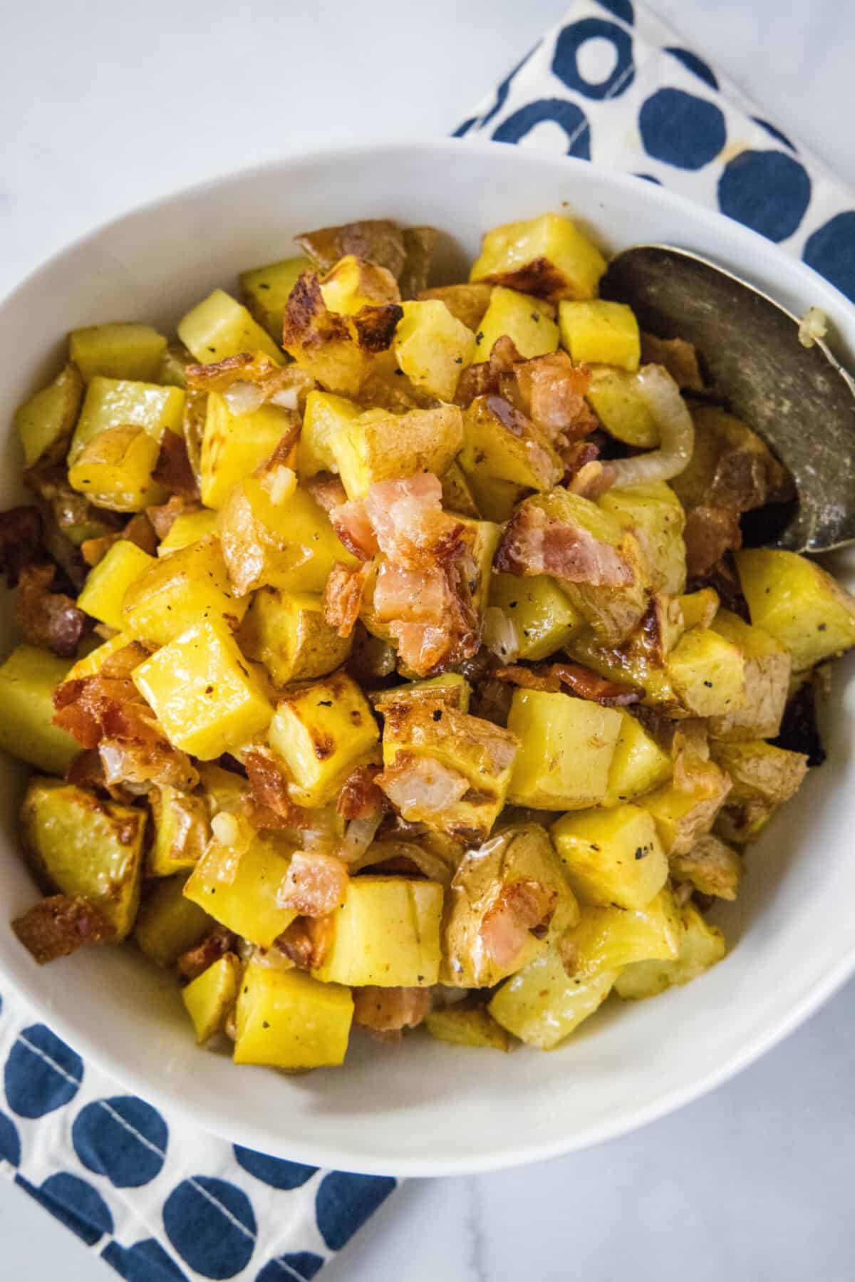 looking down on serving bowl with roasted potato salad
