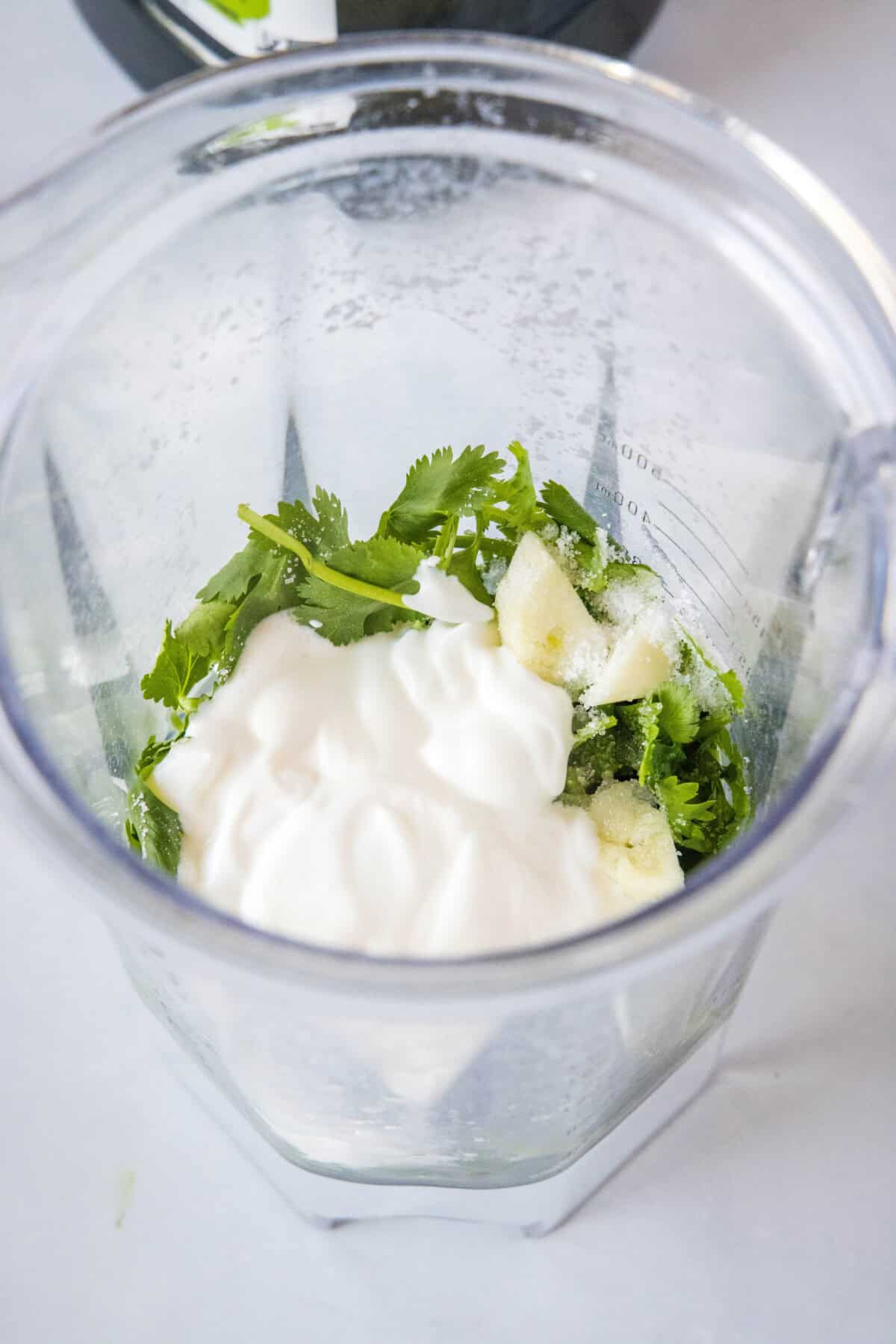 cilantro lime dressing ingredients in a blender
