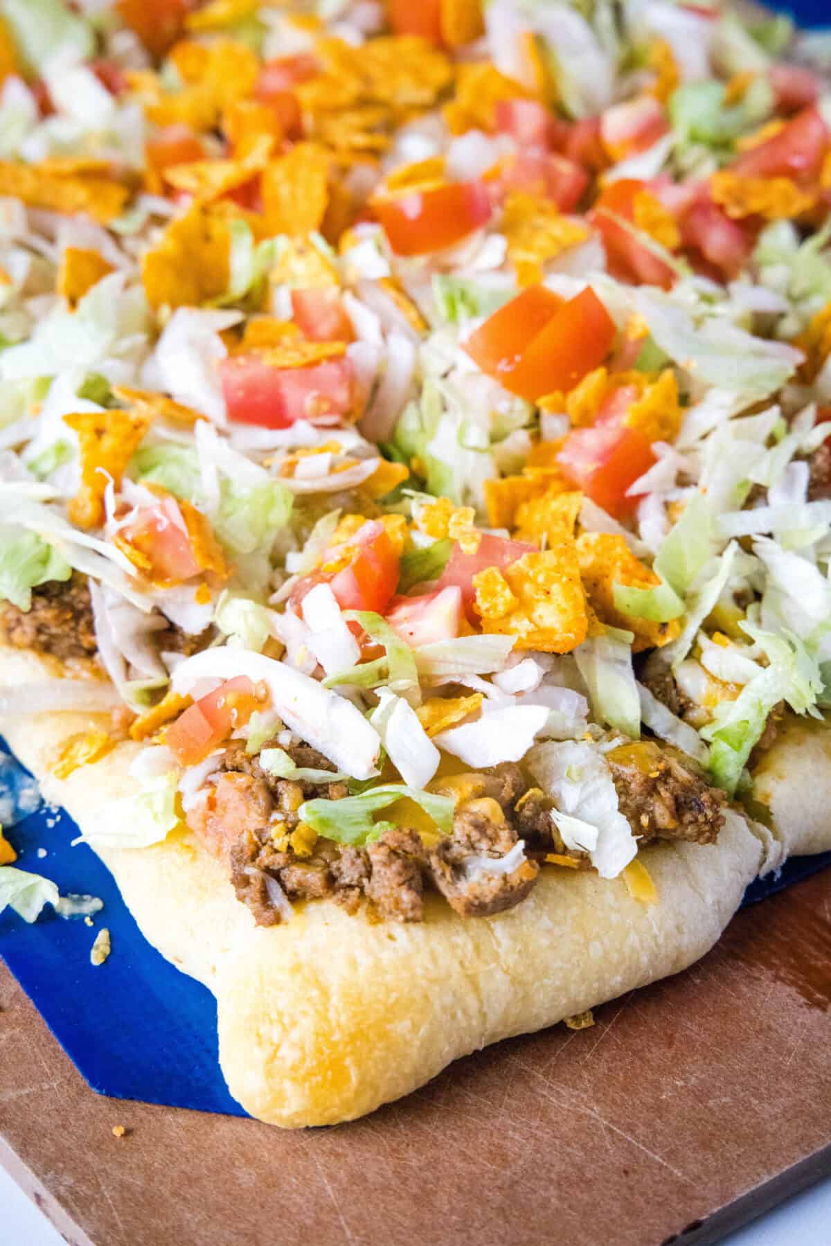 taco pizza on a cutting board