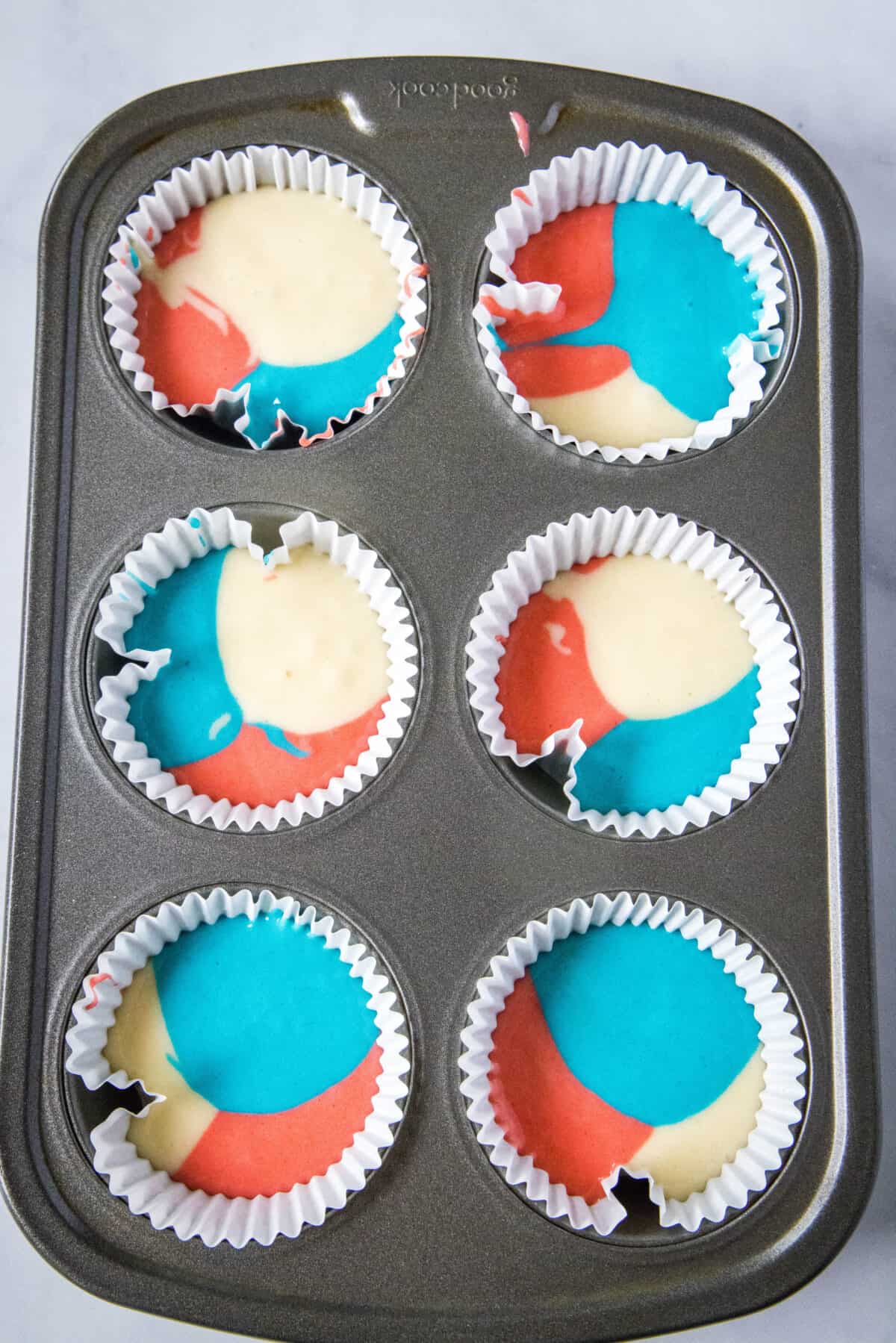 red white and blue filled muffin tins